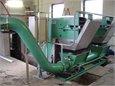 Transport, pressing and washing of screenings